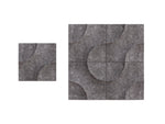 Sound-absorbing panels in various shades of gray, with a textured surface, displayed against a white background.