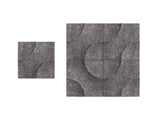 Sound-absorbing panels in various shades of gray, with a textured surface, displayed against a white background.